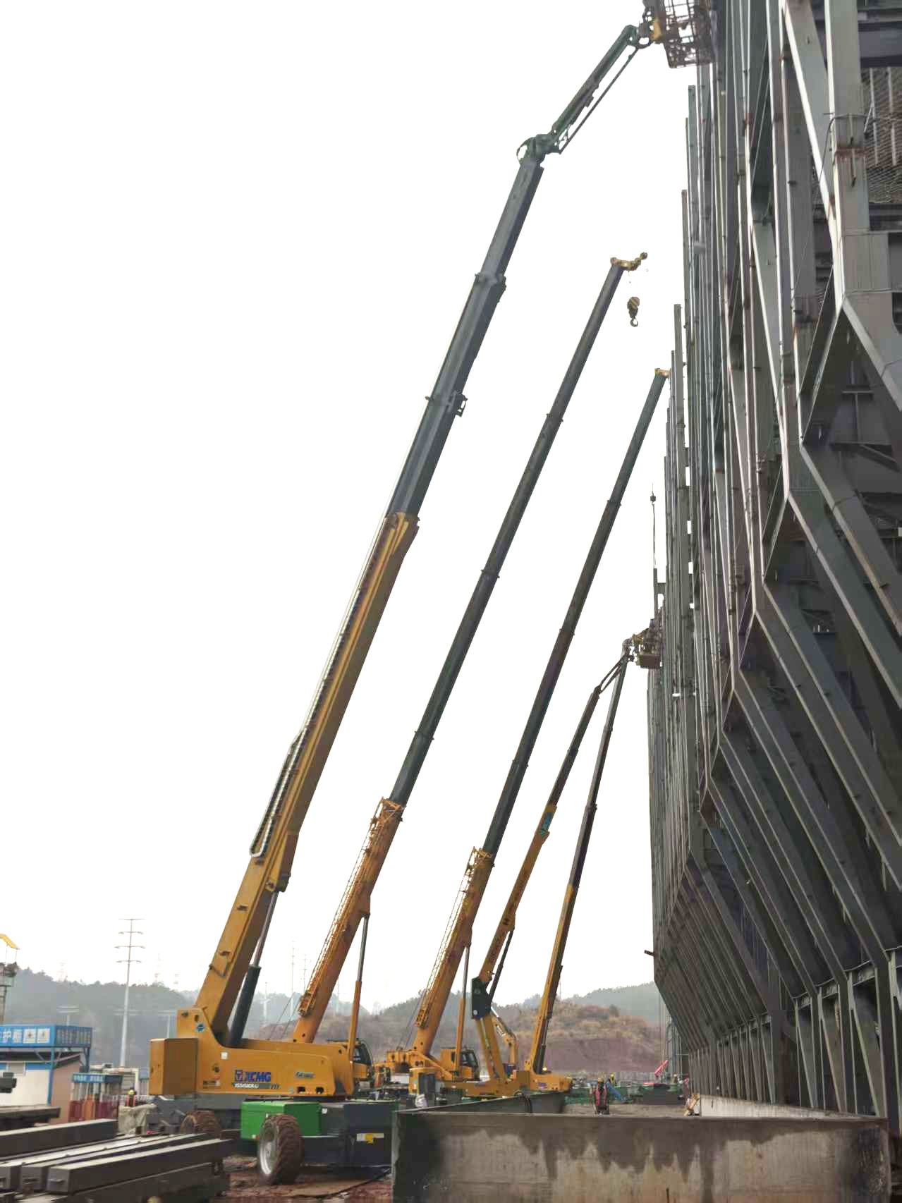 高空協(xié)同顯實(shí)力｜徐工裝備助陣銀聯(lián)黃山園區(qū)，外立面施工提質(zhì)增效